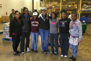 NSBE members volunteering at a food bank