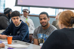 Students meeting around a table