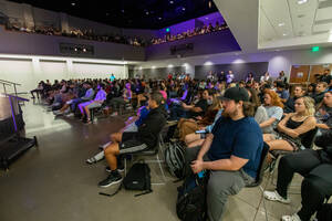 Students listening to a speech