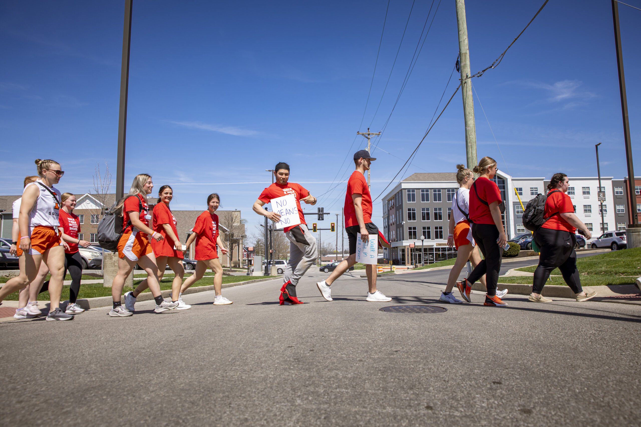 Students participating in Walk a Mile in her shoes