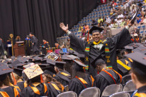 NSBE member Desmond Jones wearing the NSBE Sash celebrating graduation and 2015 commencement